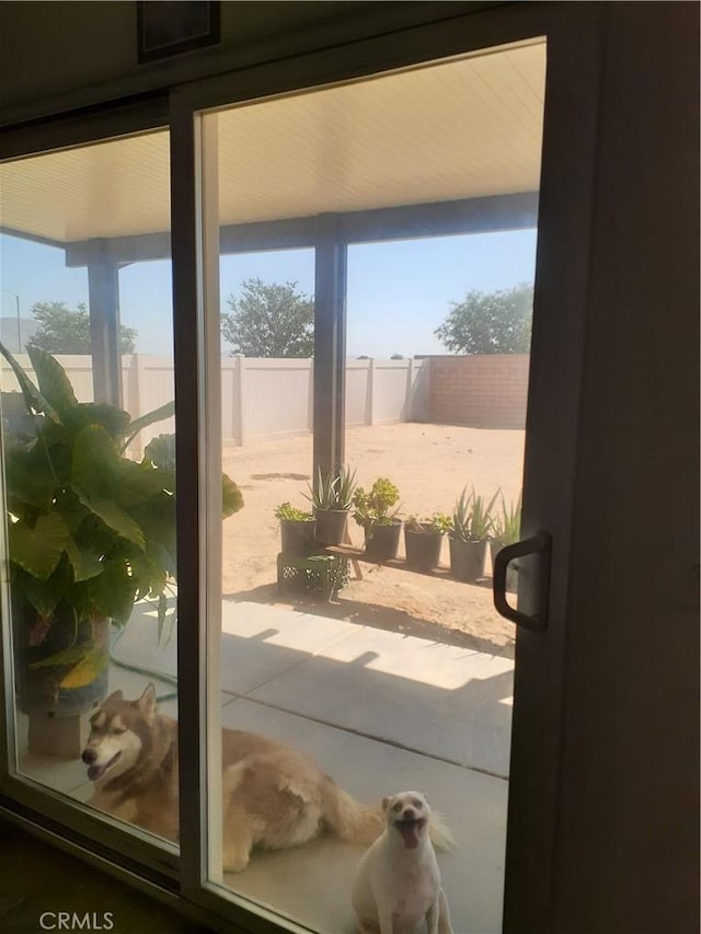 doorway to outside featuring a wealth of natural light