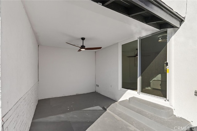 view of patio / terrace featuring ceiling fan and entry steps