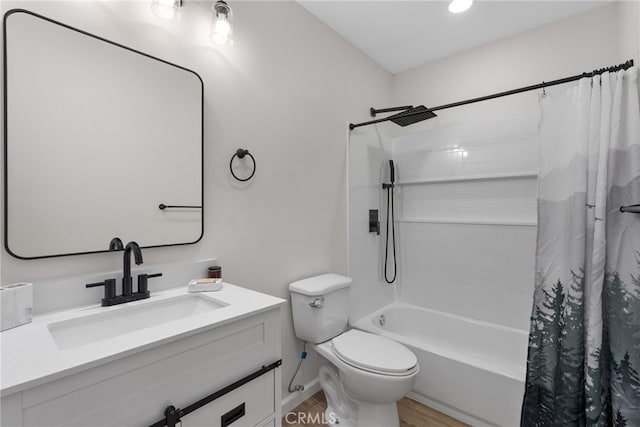 bathroom with toilet, shower / bath combination with curtain, wood finished floors, and vanity