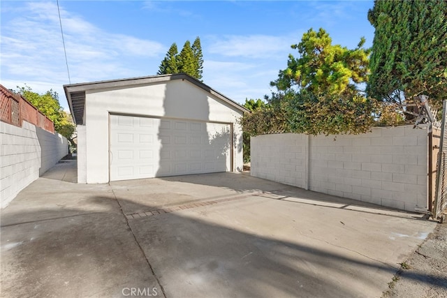 detached garage with fence