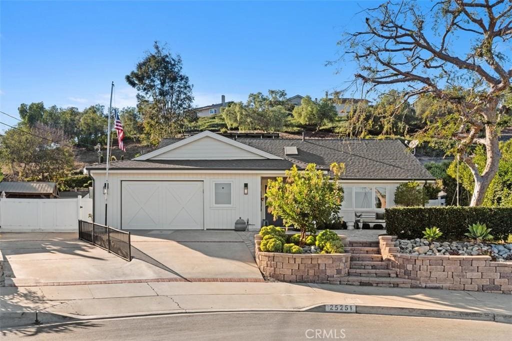 ranch-style house featuring a garage