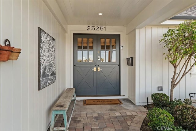 property entrance featuring french doors