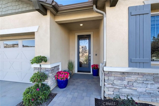 property entrance with a garage