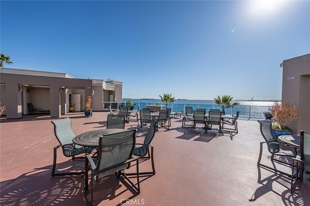 view of patio / terrace featuring a water view