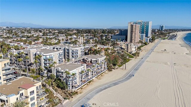 aerial view with a beach view and a water view