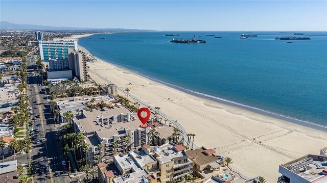 aerial view featuring a beach view and a water view