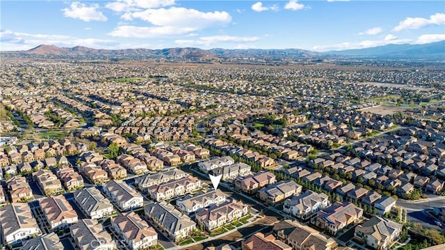 drone / aerial view featuring a mountain view