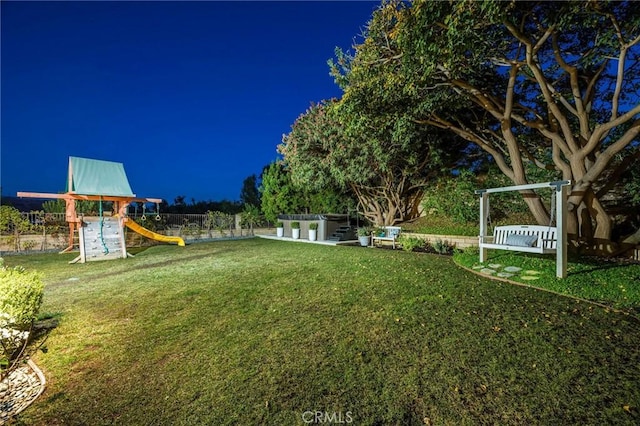 view of yard featuring a playground