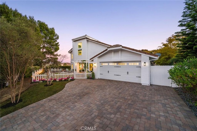 view of front of home with a garage