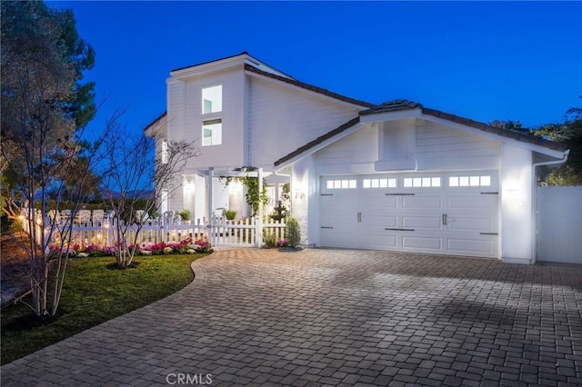 view of front of property with a garage