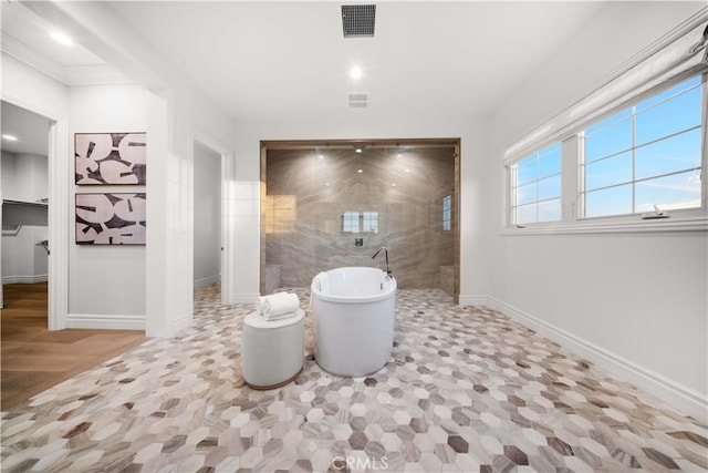 bathroom featuring separate shower and tub