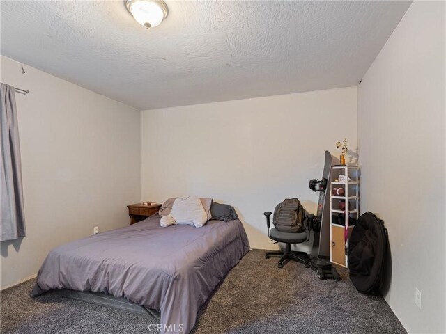 20276 Waco Rd, Apple Valley, CA 92308 - carpeted bedroom featuring a textured ceiling