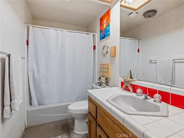 20276 Waco Rd, Apple Valley, CA 92308 - full bathroom featuring toilet, vanity, decorative backsplash, and shower / bath combination with curtain