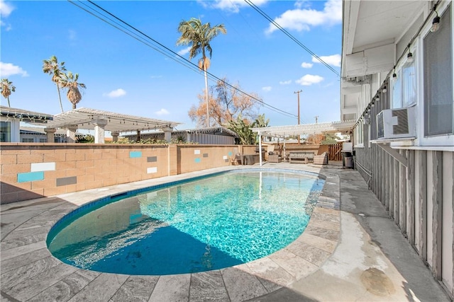 view of pool featuring a pergola and cooling unit