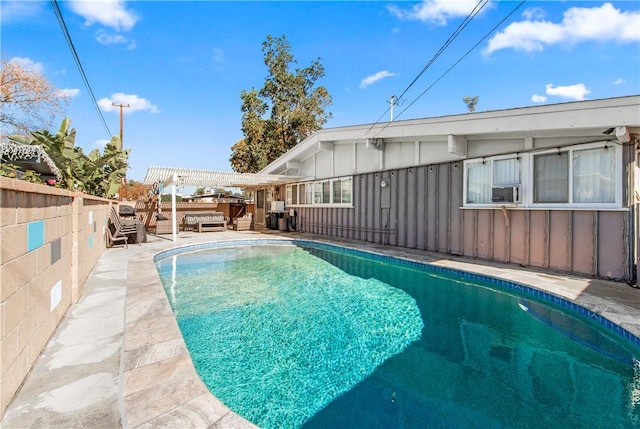 view of swimming pool featuring a pergola