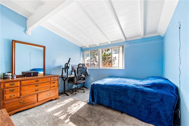 carpeted bedroom with lofted ceiling with beams