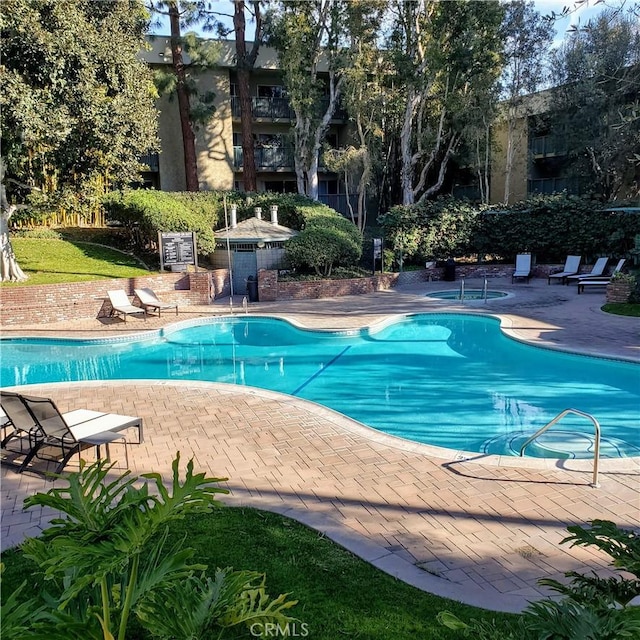 view of pool with a patio area