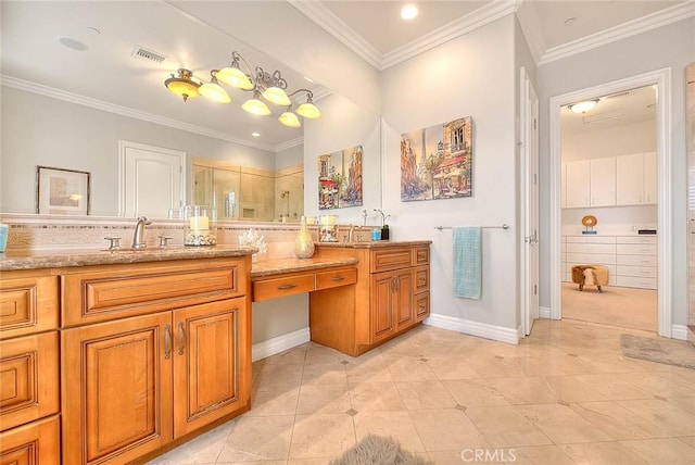 bathroom with vanity, tile patterned flooring, a shower with shower door, and ornamental molding