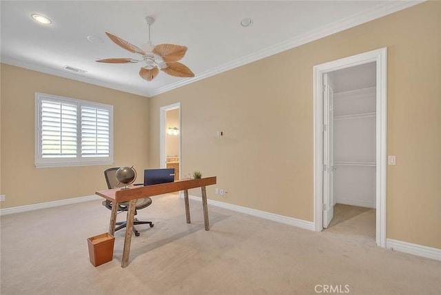 carpeted home office with crown molding and ceiling fan