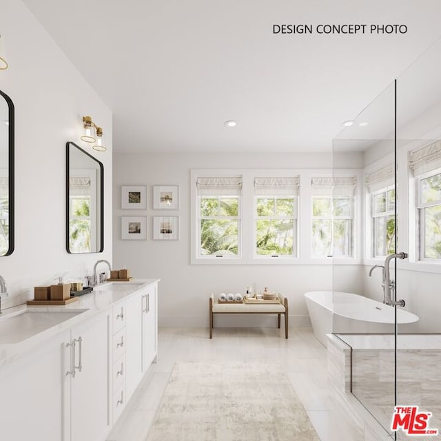 bathroom with a bath, a wealth of natural light, and vanity