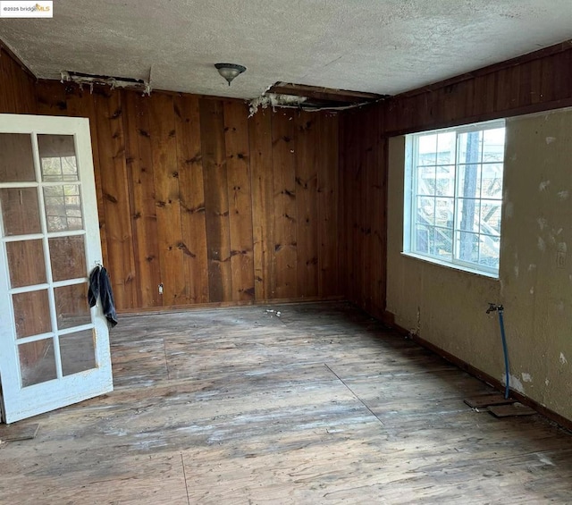 empty room featuring a textured ceiling