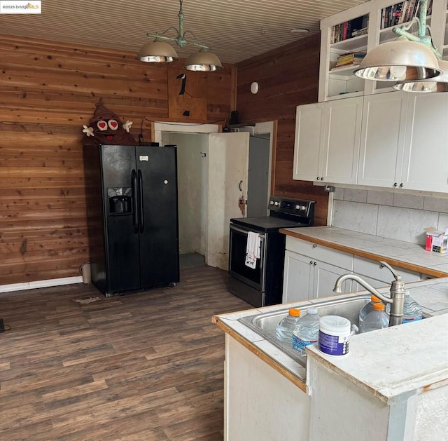 kitchen featuring wood ceiling, hanging light fixtures, stainless steel electric range, white cabinetry, and black fridge with ice dispenser