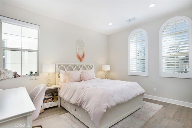 bedroom featuring light hardwood / wood-style flooring