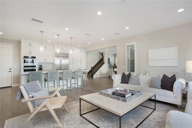 living room featuring hardwood / wood-style flooring