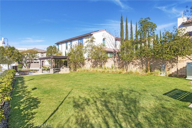 view of yard featuring a pergola and a patio area