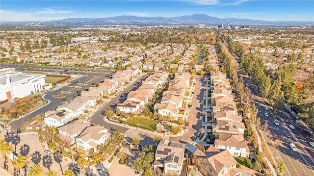 drone / aerial view featuring a mountain view