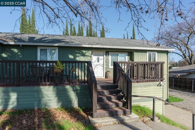 view of front of home with a wooden deck