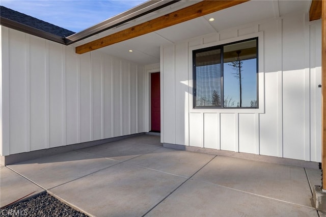 property entrance with a patio area