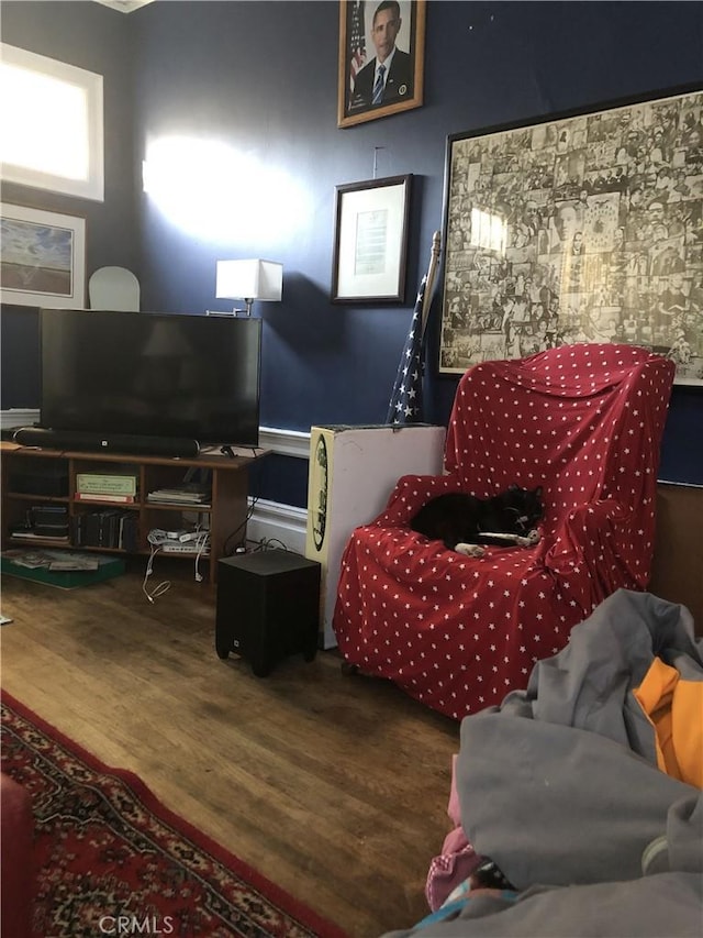 living area with wood-type flooring