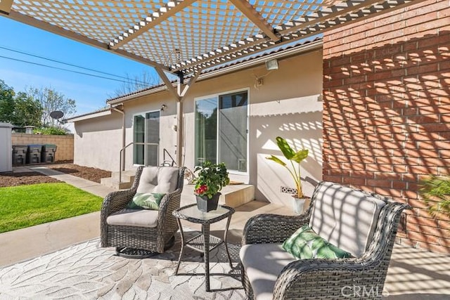 view of patio featuring a pergola