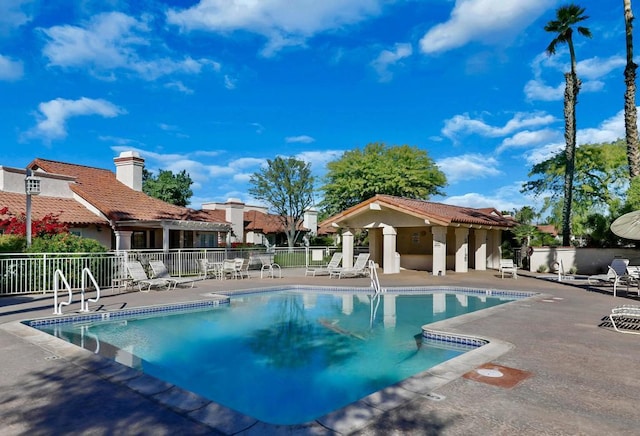 view of pool featuring a patio area