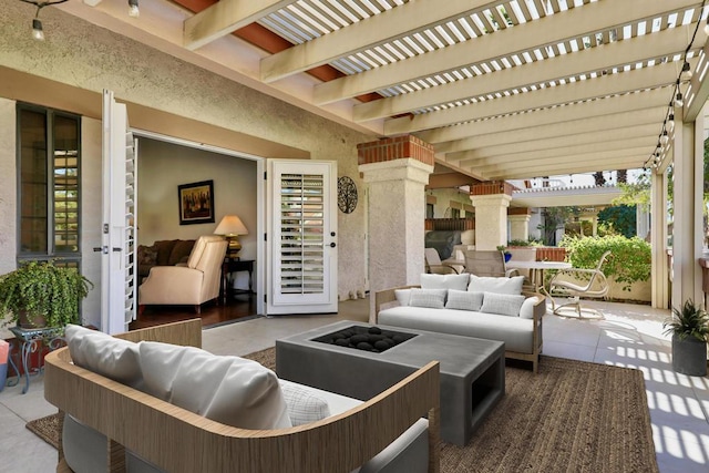 view of patio / terrace with an outdoor hangout area and a pergola