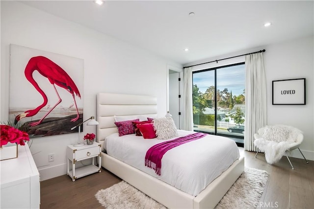 bedroom featuring dark wood-type flooring