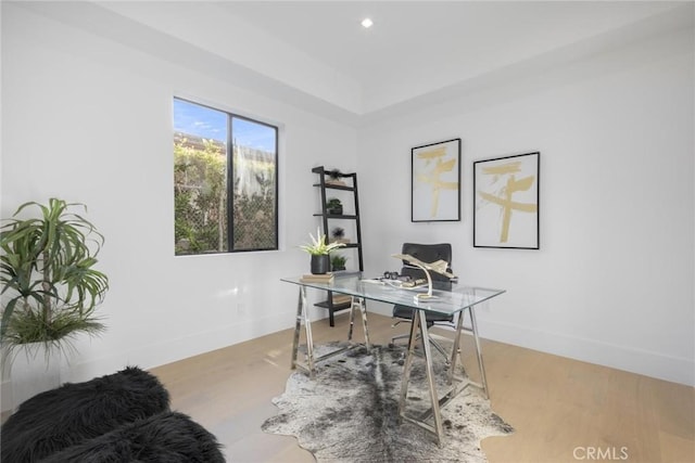 office area with hardwood / wood-style flooring