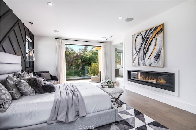 bedroom featuring hardwood / wood-style floors