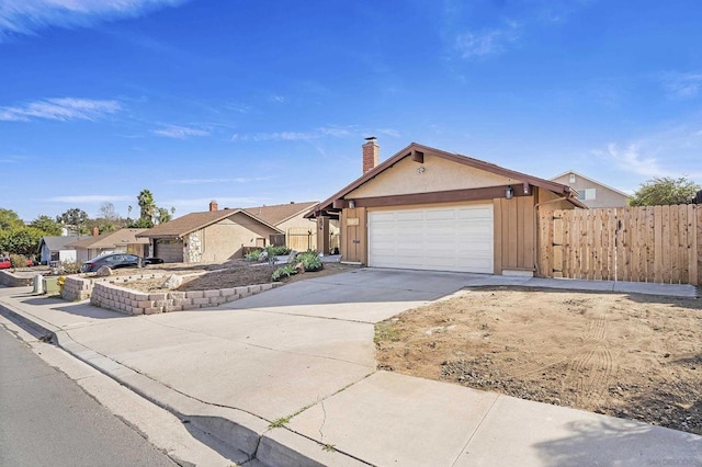 ranch-style house featuring a garage