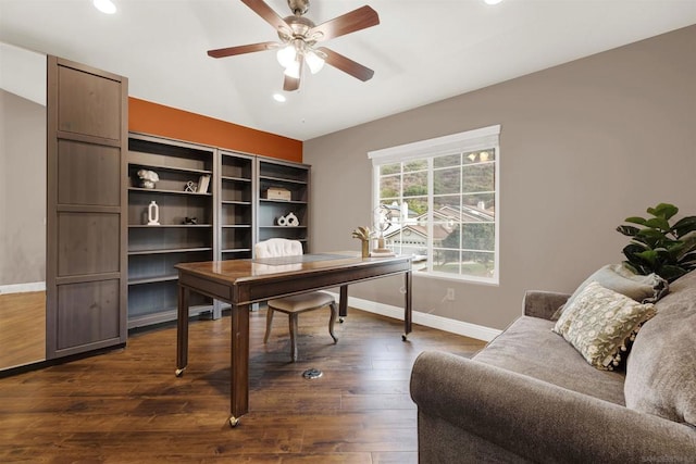 office space featuring ceiling fan and dark hardwood / wood-style floors