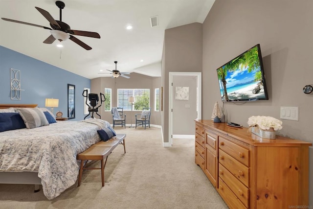 bedroom with vaulted ceiling, ceiling fan, and light carpet