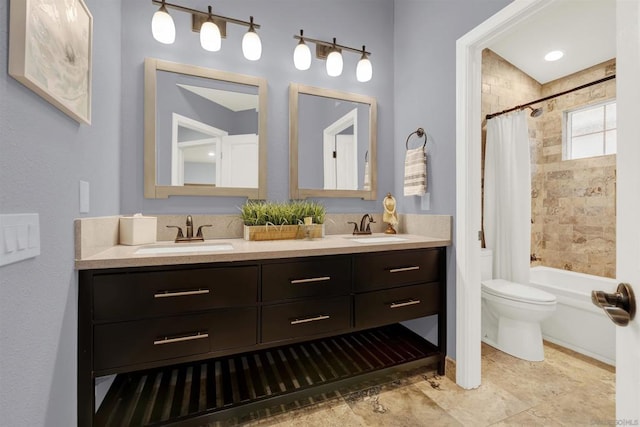 full bathroom featuring toilet, vanity, lofted ceiling, and shower / bathtub combination with curtain