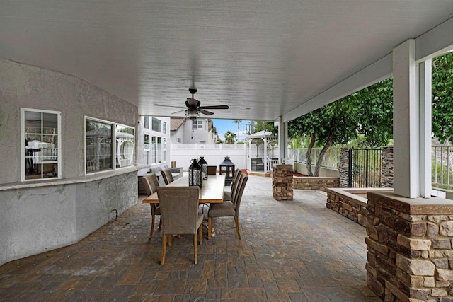 view of patio / terrace featuring ceiling fan and a gazebo