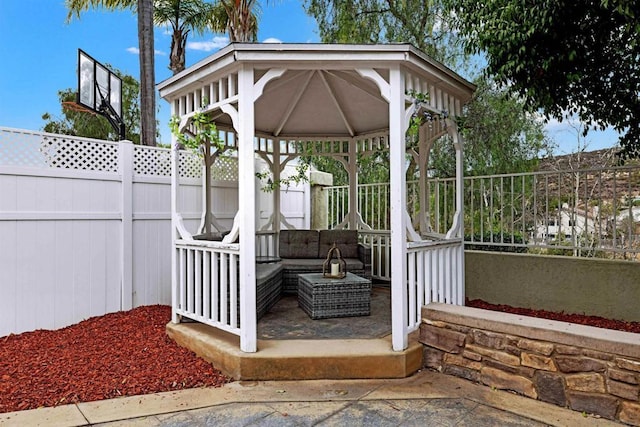 view of patio featuring a gazebo and outdoor lounge area