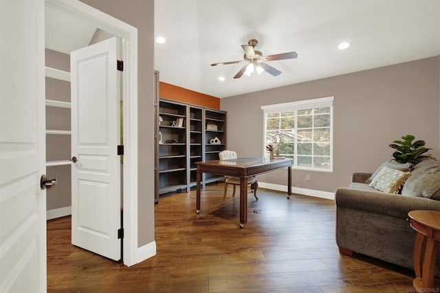 office area featuring ceiling fan and dark hardwood / wood-style flooring