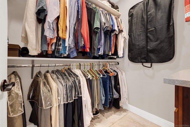 walk in closet featuring tile patterned floors