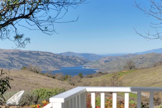 view of mountain feature featuring a water view