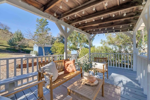 wooden deck featuring a shed