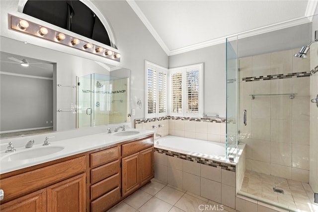 bathroom with separate shower and tub, vaulted ceiling, tile patterned floors, and crown molding